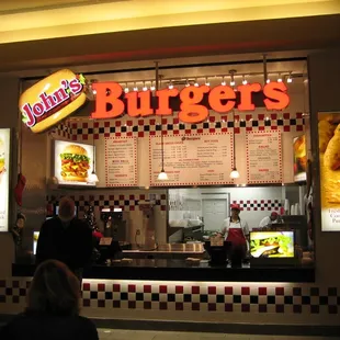 Note the sign advertising black angus and fresh cut fries.