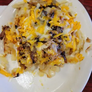 Hashbrowns with cheese and grilled onions!