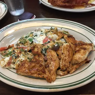 Egg white vegetable omelette with grilled chicken.. My go to protein day starter!