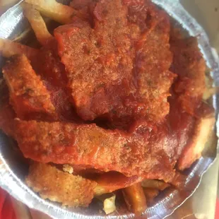 Chicken and French fries with marinara sauce