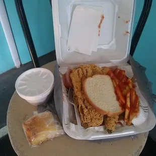 a chicken sandwich in a styrofoam container