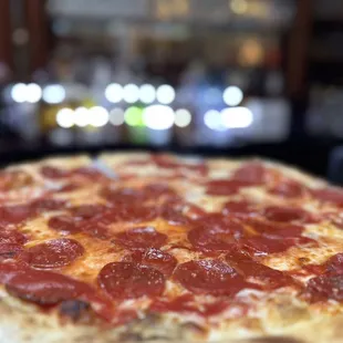 I've been going to John's for the last 15 years and I still keep coming back. The pizza taste fresh, it's like biting into heaven.