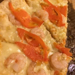 Shrimp Scampi pizza with tomatos