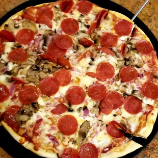 a pepperoni and mushroom pizza
