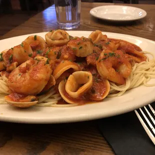 Fra diavolo seafood dish with calamari, shrimp, claims and scallops