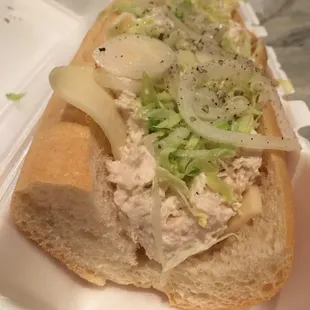 a sandwich in a styrofoam container