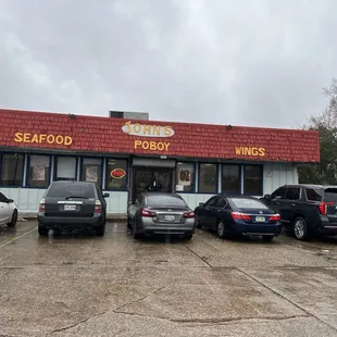 cars parked in front of the restaurant