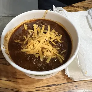 Large chili with extra cheese on top