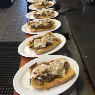 a row of plates of food