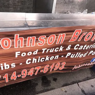 a sign for johnson brothers bbq