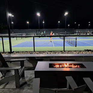 Fire Pit Table in the Pickle Patio near the pickleball courts