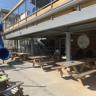 picnic tables and a slide