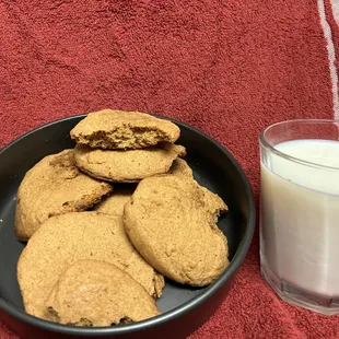 a glass of milk and a plate of cookies