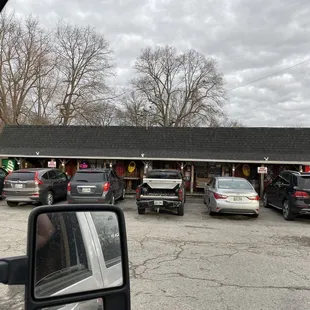 Front view. Look at the cars! Full house! More room inside than it looks!