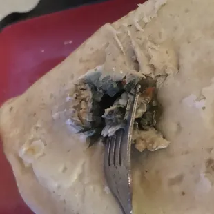 Mold on the bottom of a calzone I bought from the store. Had to pry it open to see how far deep it went into the crust.