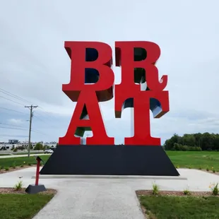 a large red sign with the word bra on it