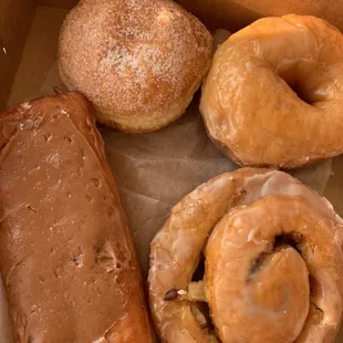 Raspberry filled, glazed, apple fritter, and caramel Long John