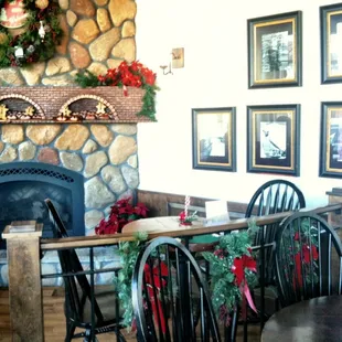 The fireplace looks cozy and inviting.