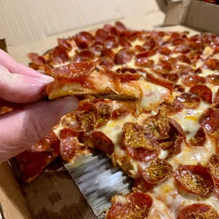 Thin crust available upon request. Firm square cut with a thin chewy dough layer. #UpCloseSavor