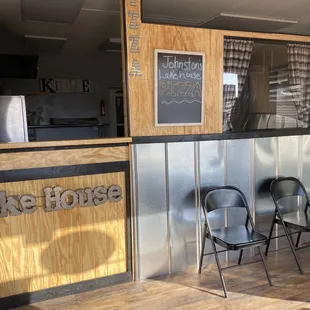 two chairs in front of the counter