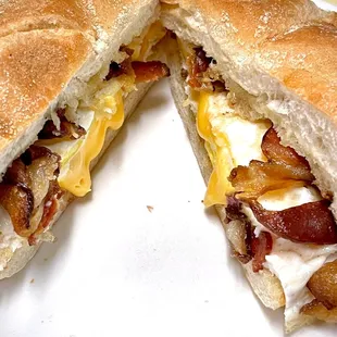 Bacon, egg, and cheese sandwich. Two eggs. Comes with one cup of coffee. $5.25 + tax + tip. Most important meal of the day!