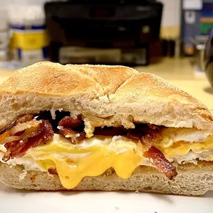Bacon, egg, and cheese sandwich. Two eggs. Comes with one cup of coffee. $5.25 + tax + tip
