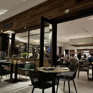 a restaurant with tables and chairs