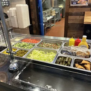 a buffet with a variety of food items