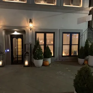 the entrance to a hotel at night