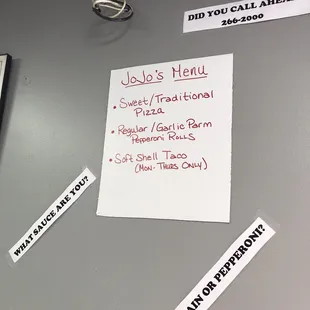 a menu on a refrigerator