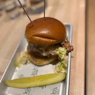 a burger and pickle