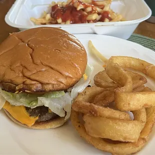 Cheese burger with fries $13.95 and some onion rings