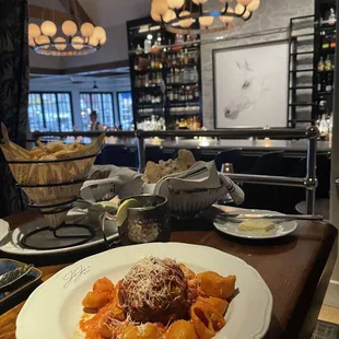 a plate of pasta and meatballs