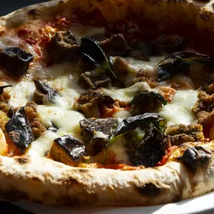 a close up of a pizza