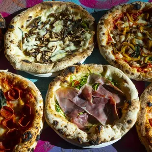 a variety of pizzas