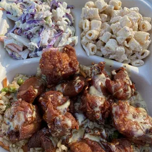 "Fried Chicken Rice Bowl" w/island style rice, homemade macaroni salad, &amp; cole slaw. I went with sweet sauce drizzled over my chicken