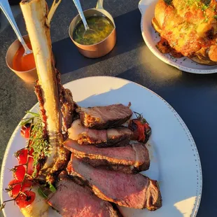 a plate of meat and vegetables