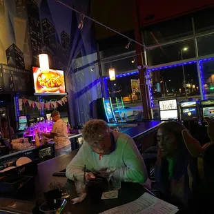 a woman sitting at a bar