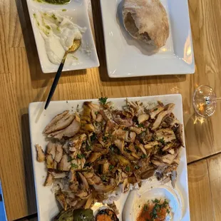 Chicken shawarma, bread, garlic sauce, spicy sauce