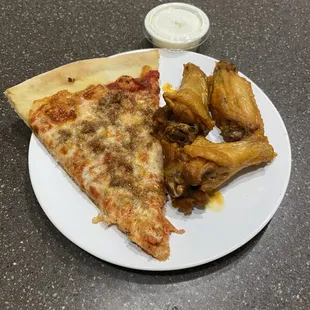 a slice of pizza and fried chicken