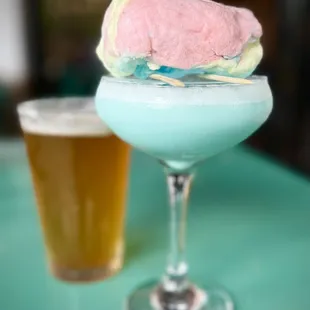 Cotton Candy Martini - Three Olives Vanilla, Heavy Cream Coconut and Cotton Candy on top.