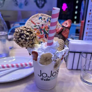 "THREE'S COMPANY"strawberry banana BIGGIE SHAKE with sugar cookie, nutty donut hole on a stick &amp; chocolate dipped sugar cone