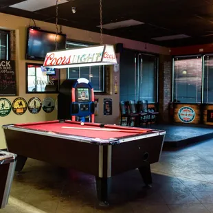a pool table in a bar