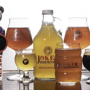 a variety of beer glasses and bottles