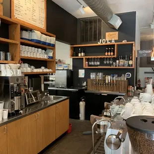 a coffee shop with a variety of coffees