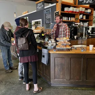 a man and a woman ordering food