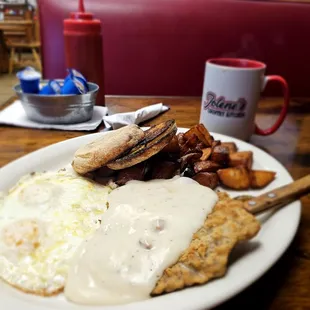 Chicken Fired steak, eggs medium, home fies, english muffin, and coffee.