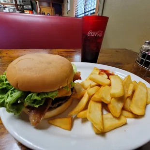 I love this place for good old home cooking. The atmosphere is homie and the food is fantastic. My favorite is the bacon burger. Yum!