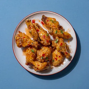 a plate of chicken wings