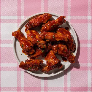 a plate of chicken wings